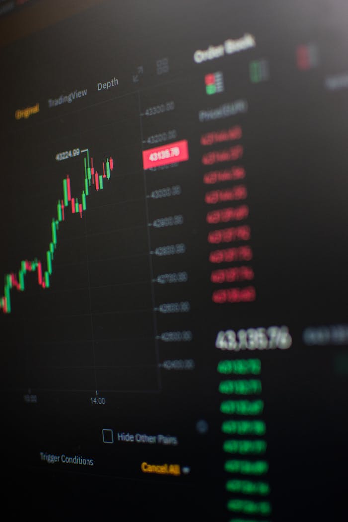services-02 Close-up view of a cryptocurrency trading screen showing market trends and data.